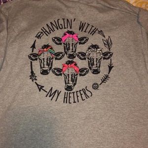 Large hanging with my heifer shirt. Never worn.